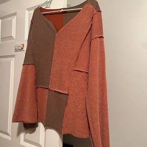 Easel sweater. Exposed seems. Block color.